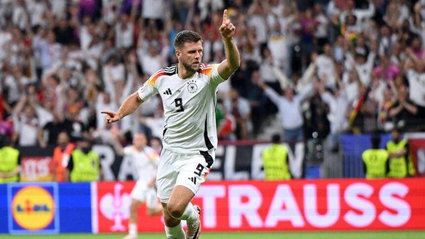 Germany grab stoppage-time equaliser to deny Switzerland and top group