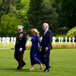 Biden honors US war dead with a cemetery visit ending a French trip that served as a rebuke to Trump