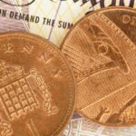 British Pennies on a Pound Note