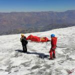 The body of an American climber buried by an avalanche 22 years ago in Peru is found in the ice