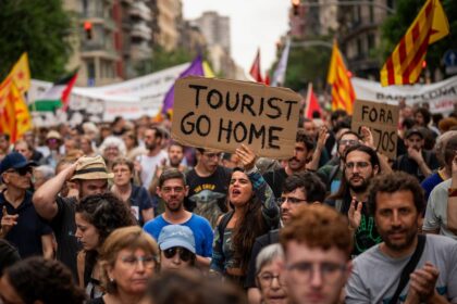 Barcelona protesters spray visitors with water: Why has Europe fallen out of love with tourism?