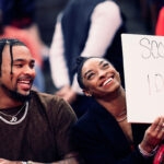 HOUSTON, TEXAS - JANUARY 29: Simone Biles and Jonathan Owens attend a game between the Houston Rockets and the Los Angeles Lakers at Toyota Center on January 29, 2024 in Houston, Texas. NOTE TO USER: User expressly acknowledges and agrees that, by downloading and or using this photograph, User is consenting to the terms and conditions of the Getty Images License Agreement.  (Photo by Carmen Mandato/Getty Images)