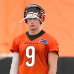 CINCINNATI, OHIO - JUNE 12: Joe Burrow #9 of the Cincinnati Bengals looks on during mandatory minicamp at the IEL Indoor Facility on June 12, 2024 in Cincinnati, Ohio. (Photo by Dylan Buell/Getty Images)