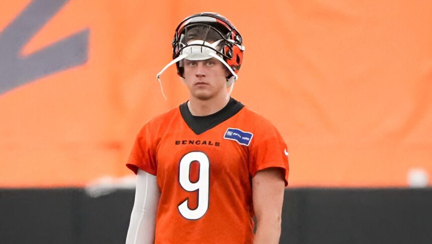 CINCINNATI, OHIO - JUNE 12: Joe Burrow #9 of the Cincinnati Bengals looks on during mandatory minicamp at the IEL Indoor Facility on June 12, 2024 in Cincinnati, Ohio. (Photo by Dylan Buell/Getty Images)