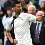 LONDON, ENGLAND - JULY 08: Novak Djokovic of Serbia addresses the crowd on Centre Court wishing them a 'good night' following victory against Holger Rune of Denmark in his Gentlemen's Singles fourth round match during day eight of The Championships Wimbledon 2024 at All England Lawn Tennis and Croquet Club on July 08, 2024 in London, England. (Photo by Mike Hewitt/Getty Images)