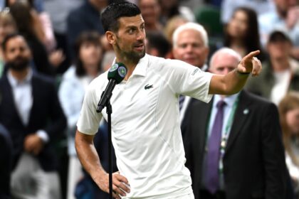 LONDON, ENGLAND - JULY 08: Novak Djokovic of Serbia addresses the crowd on Centre Court wishing them a 'good night' following victory against Holger Rune of Denmark in his Gentlemen's Singles fourth round match during day eight of The Championships Wimbledon 2024 at All England Lawn Tennis and Croquet Club on July 08, 2024 in London, England. (Photo by Mike Hewitt/Getty Images)