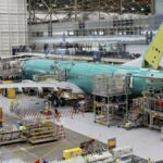 Troubled plane maker Boeing names new CEO as it reveals billion-dollar loss