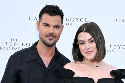 Taylor Lautner and wife Taylor Lautner wearing black outfits