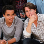 Tom Cruise and Connor Cruise at basketball game.