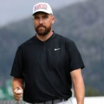 STATELINE, NEVADA - JULY 14: NFL football player Travis Kelce prepares to gift a golf ball at the 18th hole on day three of the 2024 American Century Championship at Edgewood Tahoe Golf Course on July 14, 2024 in Stateline, Nevada. (Photo by Isaiah Vazquez/Getty Images)