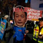 South Korea's Justice Ministry imposes a travel ban on President Yoon over martial law