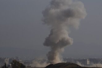 Israeli airstrike on Syria kills 11 people, war monitor reports