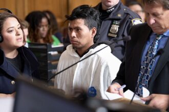 Man accused of NYC subway murder fanned flames with a shirt, prosecutors say