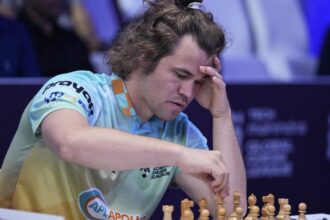 Norway's chess grandmaster quits tournament in dispute over his jeans