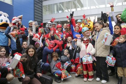 Superheroes deliver festive gifts to young Kosovo cancer patients at Pristina hospital