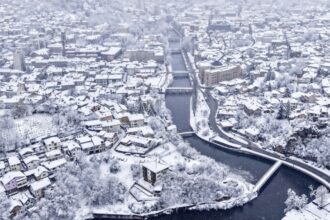 Tens of thousands of homes left without power as heavy snow and winds grip the Balkans