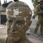 Tomb of Bashar al-Assad's father set alight after Syrian rebel victory