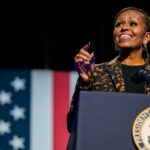 KALAMAZOO, MICHIGAN - OCTOBER 26: Former first lady Michelle Obama speaks ahead of the arrival of Democratic presidential nominee, U.S. Vice President Kamala Harris during a campaign rally at the Wings Event Center on October 26, 2024 in Kalamazoo, Michigan. Vice President Harris will be campaigning today with former first lady Michelle Obama in the battleground swing state of Michigan. With 10 days remaining, Harris continues campaigning against Republican presidential nominee, former U.S. President Donald Trump ahead of the November 5 election.  (Photo by Brandon Bell/Getty Images)