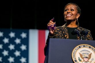 KALAMAZOO, MICHIGAN - OCTOBER 26: Former first lady Michelle Obama speaks ahead of the arrival of Democratic presidential nominee, U.S. Vice President Kamala Harris during a campaign rally at the Wings Event Center on October 26, 2024 in Kalamazoo, Michigan. Vice President Harris will be campaigning today with former first lady Michelle Obama in the battleground swing state of Michigan. With 10 days remaining, Harris continues campaigning against Republican presidential nominee, former U.S. President Donald Trump ahead of the November 5 election.  (Photo by Brandon Bell/Getty Images)