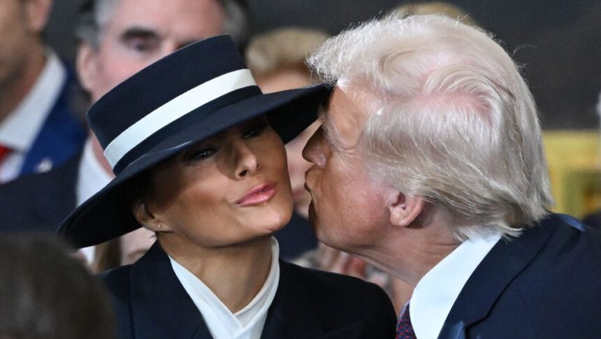 WASHINGTON, DC - JANUARY 20: U.S. President-elect Donald Trump kisses Melania Trump at his inauguration in the U.S. Capitol Rotunda on January 20, 2025 in Washington, DC. Donald Trump takes office for his second term as the 47th President of the United States. (Photo by Saul Loeb-Pool/Getty Images)