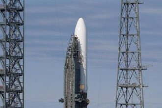 Jeff Bezos’ space company calls off debut launch of massive new rocket in final minutes of countdown