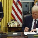 Trump pardons 6 January perpetrators as he signs slew of executive orders on first day in office